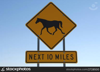 Horse Crossing Next 10 Miles sign