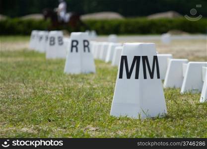 Horse dressage arena letter post and field fence