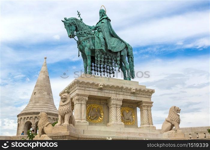 Horse riding statue of Stephen I the first king of Hungary in front of Fisherman&rsquo;s bastion in Budapest in Hungary in a beautiful summer day