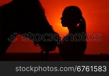 Horseback riding vacations at sunset background