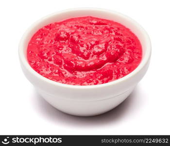 Horseradish red sauce in ceramic bowl isolated on white. High quality photo. Horseradish red sauce in ceramic bowl isolated on white