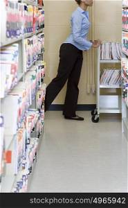Hospital administrator with files