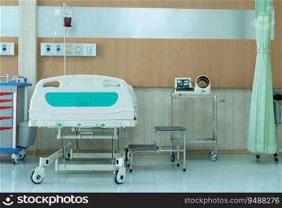 Hospital bed in emergency room with equipment ready for emergencies