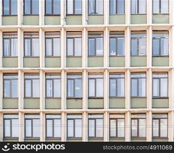 Hospital building covered with windows background