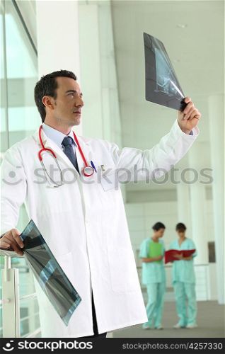 Hospital doctor looking at an xray
