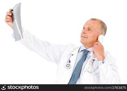 Hospital professional doctor hold and look at x-ray on phone