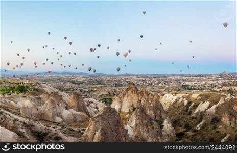 Hot air balloons in the blue sky over Cappadocia. Goreme, Turkey. Hot air balloons in the blue sky over Cappadocia