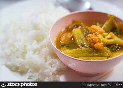 Hot and sour, fish and vegetable ragout with rice