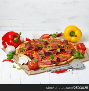 Hot baked pizza with different ingredients on wooden table