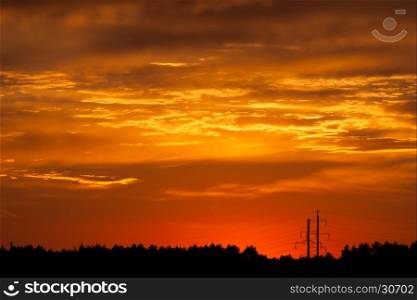 Hot bright vibrant orange and yellow colors sunset sky
