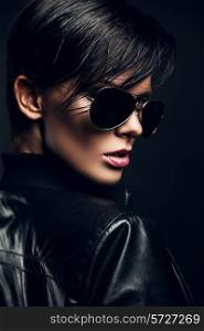 hot brunette woman in black sunglasses