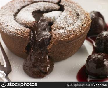 Hot Chocolate Fondant Pudding with Black Cherry Syrup