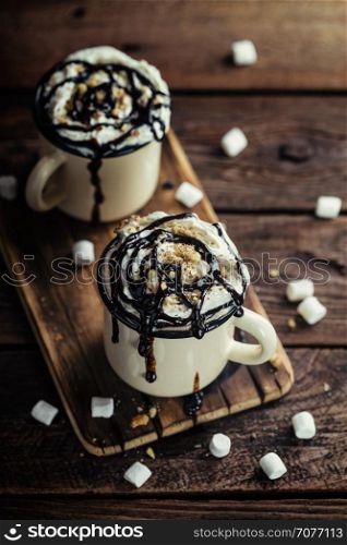 hot chocolate or irish coffee or cocoa drink with whipped cream