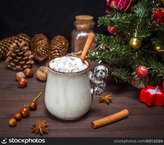 hot chocolate with white marshmallow slices in a ceramic mug on a brown wooden table