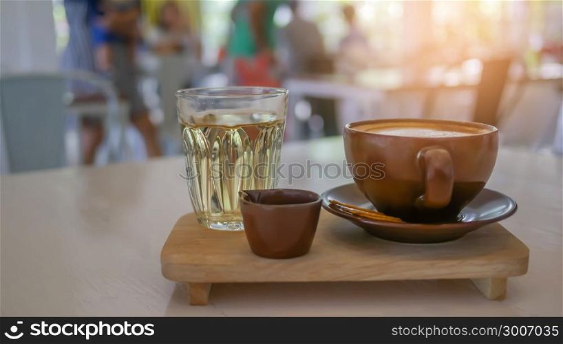 hot coffee cup and hot tea. hot coffee cup and hot tea over wooden plate