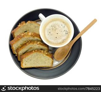 hot coffee in white cup and slices of banana cake on dish over white background. coffee and bread