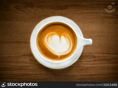 Hot Coffee Latte Cup on Wooden Table. Top View