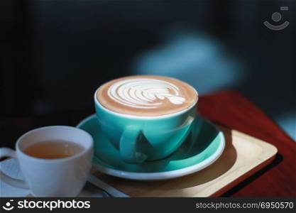 Hot Coffee latte with tulip foam style.