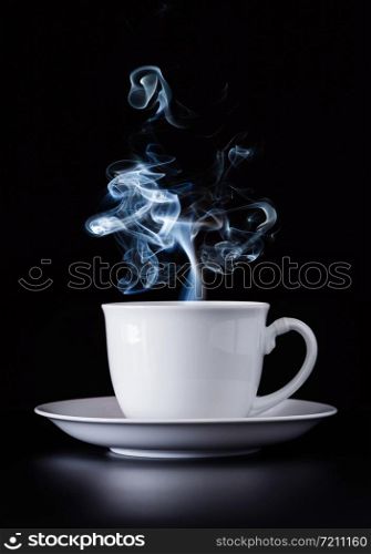 Hot coffee mugs on a black background