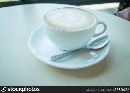 Hot cup of coffee latte, stock photo