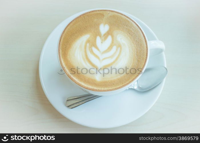 Hot cup of coffee latte, stock photo