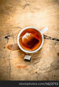hot Cup of tea. On wooden background.. hot Cup of tea.