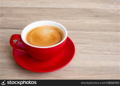 Hot espresso coffee on table, Red coffee cup in cafe or home.Top view with blank copy space for your text.