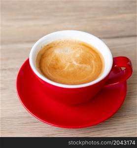 Hot espresso coffee on table, Red coffee cup in cafe or home.Top view with blank copy space for your text.