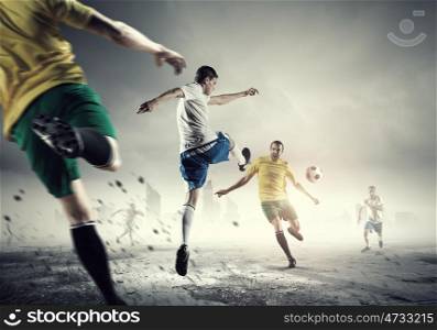 Hot football moments. Football determined players outdoors fighting for ball