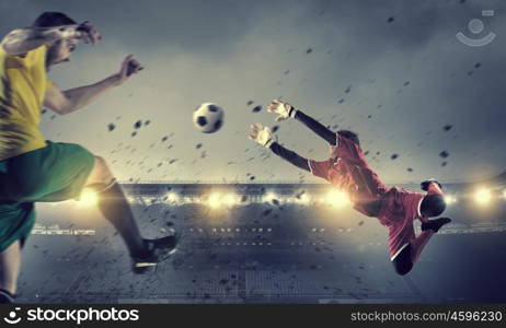 Hot football moments. Football players at stadium field fighting for ball