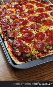Hot Home-made Pepperoni Pizza with Cheese and Vegetables