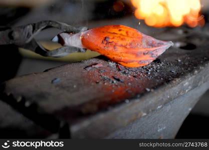 hot item on the anvil in the forge