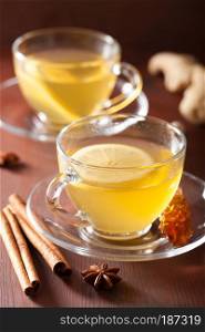 hot lemon ginger cinnamon tea in glass cup