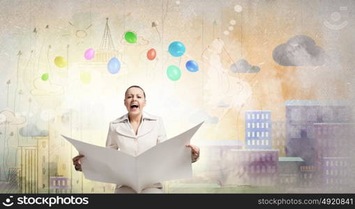 Hot news. Portrait of young businesswoman in white suit reading blank newspaper