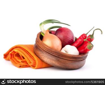 Hot red chili or chilli pepper in wooden bowl isolated on white background cutout