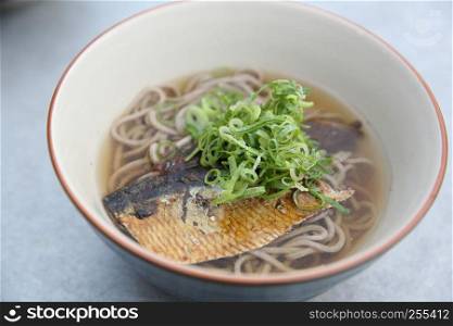 hot soba noodle with mackerel fish , japanese noodle food