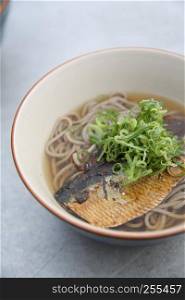 hot soba noodle with mackerel fish , japanese noodle food