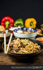 hot spicy stir fried instant noodle with beef vegetable ceramic bowl