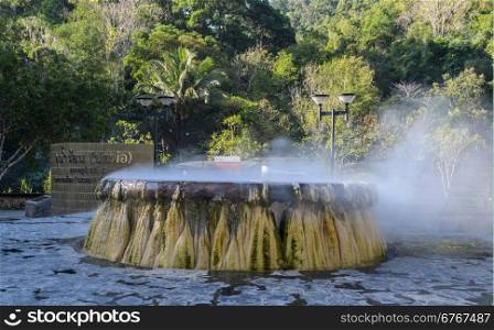 Hot springs pool at Raksawarin Public Park in Ranong, Thailand. Temperature of the water in the natural spring pool about 65 C.