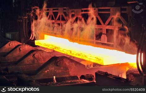 hot steel on conveyor in plant