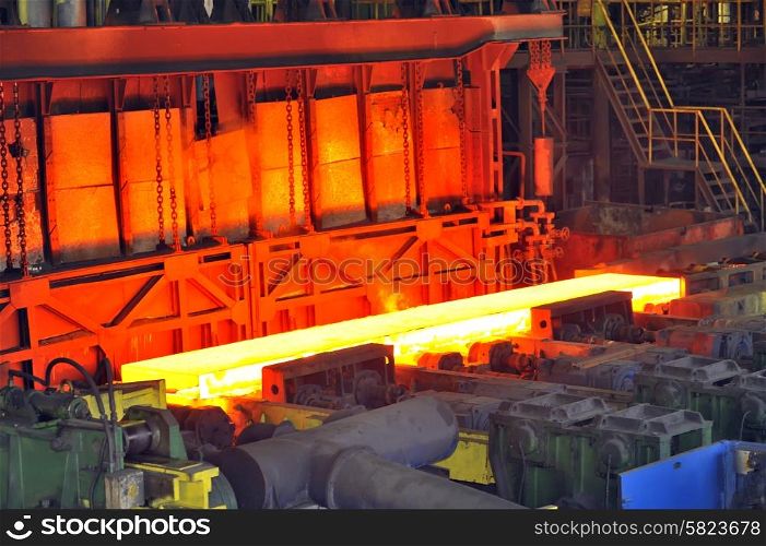 hot steel on conveyor in plant