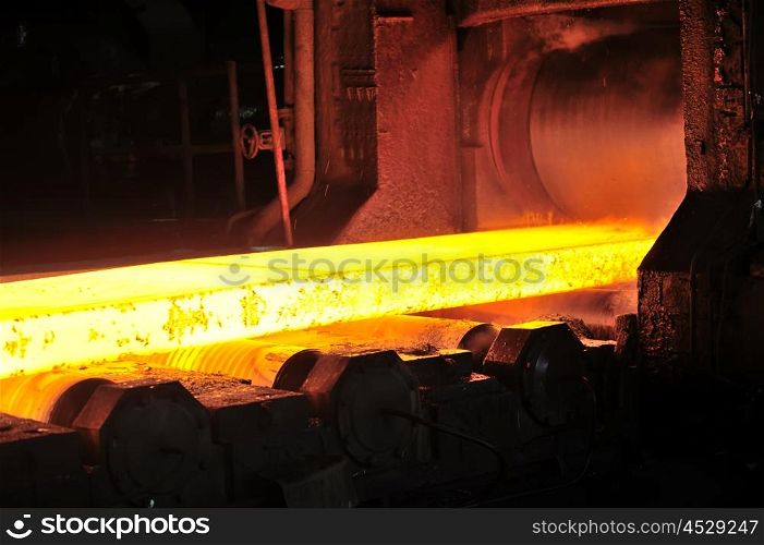 hot steel plate on conveyor in steel plant