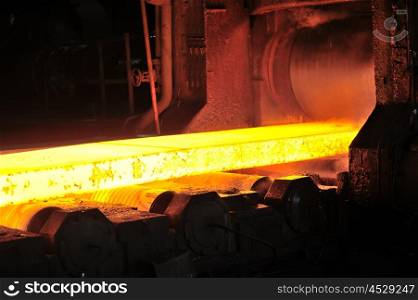 hot steel plate on conveyor in steel plant
