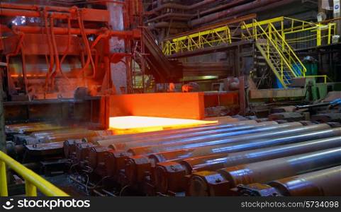 hot steel sheet on conveyor; sheet metal