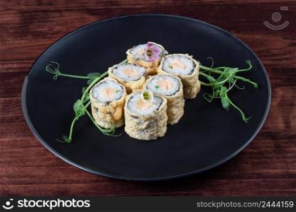 Hot sushi or rolls baked in the batter. Hot sushi or rolls baked in batter