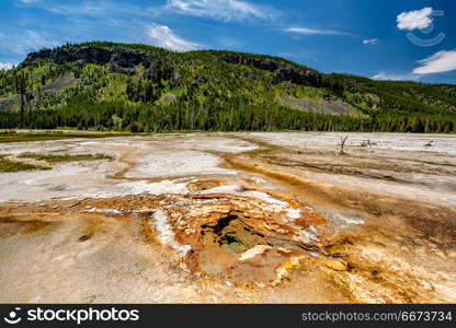 Hot thermal spring in Yellowstone . Hot thermal spring in Yellowstone National Park, Black Sand Basin area, Wyoming, USA