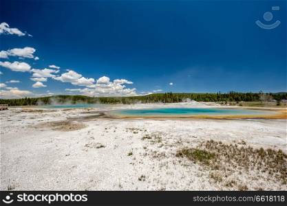 Hot thermal spring Rainbow Pool in Yellowstone National Park, Black Sand Basin area, Wyoming, USA