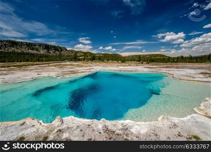 Hot thermal spring Sapphire Pool in Yellowstone National Park, Biscuit Basin area, Wyoming, USA