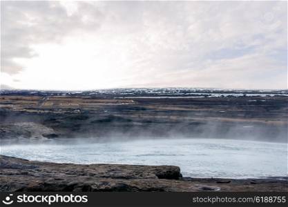 Hot water pond with steam in Iceland