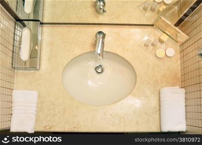 hotel bathroom sink high angle top view